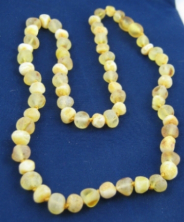 <u>Unpolished Clear & Opaque<br>Larger Beads</u>