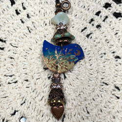 moon rising blue bird necklace pendant