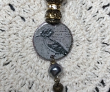 dashing bird, enameled necklace pendant