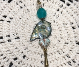 sacred spring flos enameled bird necklace pendant