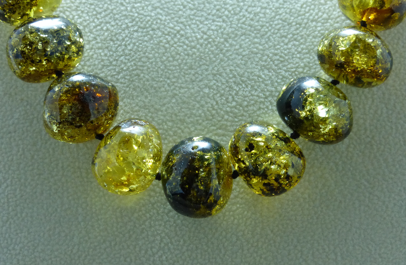 <u>Baltic Amber Necklace - Polished Yellow/Green & Black</u><br>$206.21 w/ discount code: 25