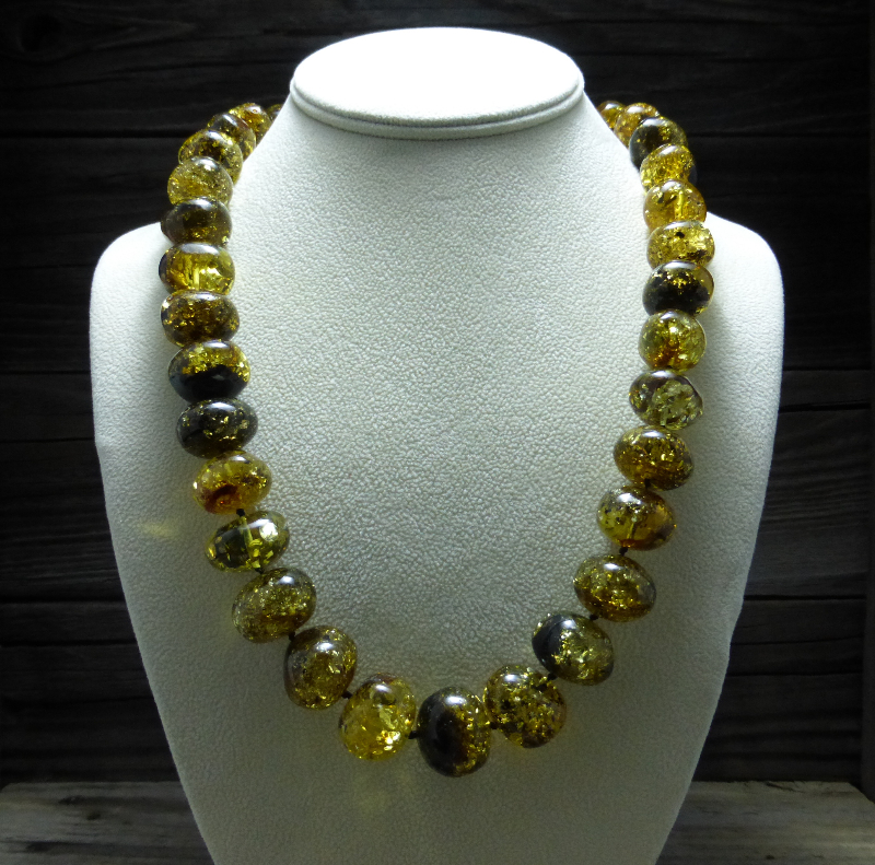 <u>Baltic Amber Necklace - Polished Yellow/Green & Black</u><br>$206.21 w/ discount code: 25
