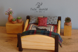 Wooden bed with bedding