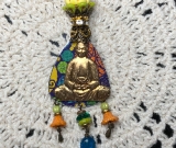 buddha in transformational ecstasy, kyanite , vintage tin necklace pendant